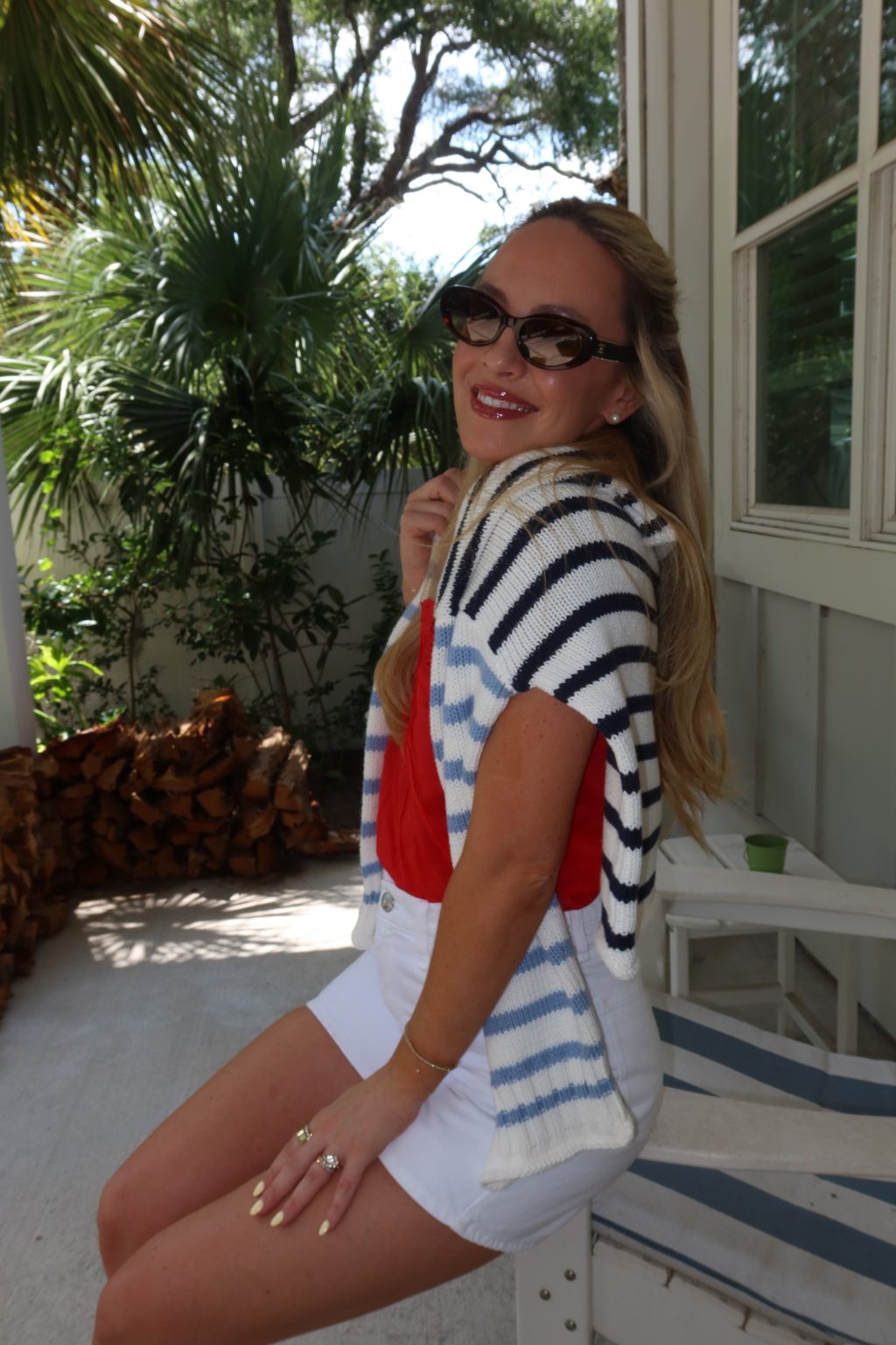woman smiling outdoors in summer